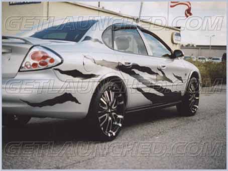 Black-Rip-Car-Graphics-Decals <a href="http://www.getlaunched.com/gallery_pics.html">http://www.getlaunched.com/gallery_pics.html